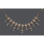 A delicate 19th c. seed pearl set foliate fringe drop necklace