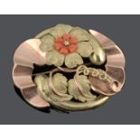An attractive Continental coral set floral scroll brooch, c1930