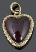 A small Georgian cabochon garnet set heart pendant