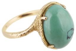 An unusual turquoise dress ring in fancy coiled mount