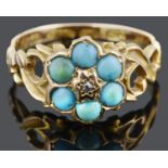 An Victorian turquoise and diamond set Forget me Not cluster ring