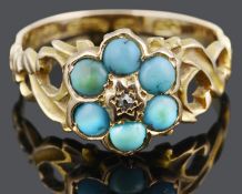 An Victorian turquoise and diamond set Forget me Not cluster ring