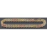 A contemporary three colour 9ct gold rope twist neck chain