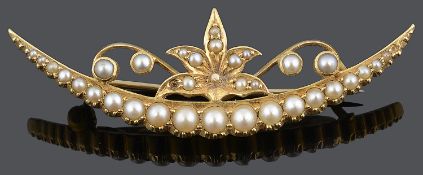 A Victorian floral crescent half pearl set brooch