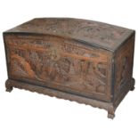 An early 20th c. Chinese carved teak domed blanket chest