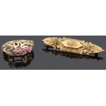 A Victorian Etruscan style thread work brooch and a ruby set ring