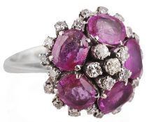 An attractive Continental ruby and diamond hexagonal cluster ring