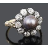 An unusual large late Georgian natural black pearl and diamond set cluster ring