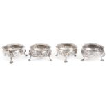 A matched set of four George III silver cauldron salts,