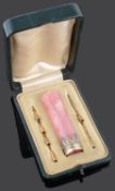 An early 20th century Fr. 18ct. gold mounted rose quartz parasol handle