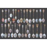 Collection of mostly early 20th century continental .800 silver gilt and enamel souvenir teaspoons