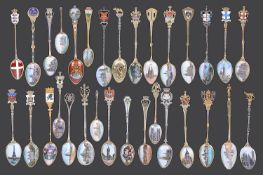 Collection of mostly early 20th century continental .800 silver gilt and enamel souvenir teaspoons