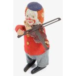 A 1930s Schuco clockwork tinplate violin playing dancing clown