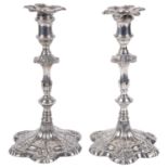 A pair of George II silver candlesticks