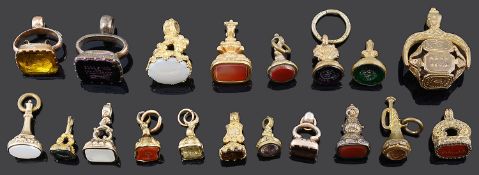 An interesting collection of Georgian and Victorian hard stone intaglio set and novelty fob seals