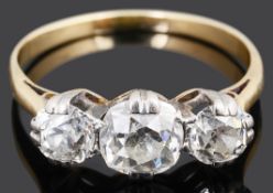 An attractive three stone old cut diamond set ring