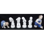 A collection of Royal Copenhagen and Bing and Grondahl porcelain figurines