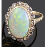 A large early twentieth century opal and rose diamond set cluster ring