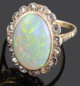 A large early twentieth century opal and rose diamond set cluster ring