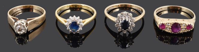 A delicate 18ct. gold sapphire and diamond cluster ring and three other rings