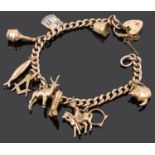 A 9ct rose gold curb link charm bracelet