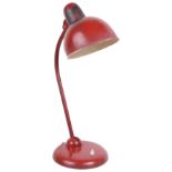 A mid century Kaiser-Idell Original Industrial Model 6551 red enamel swan neck adjustable desk lamp
