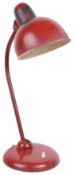 A mid century Kaiser-Idell Original Industrial Model 6551 red enamel swan neck adjustable desk lamp