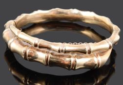 A 9ct gold hinged coiled bamboo effect bangle