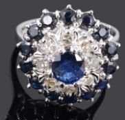 A large Continental 18ct sapphire set cluster dress ring