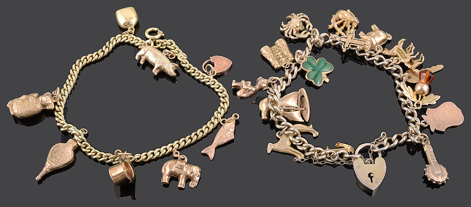 A delicate gold charm bracelet and another charm bracelet