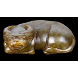 A contemporary Chinese spinach jade carving of a recumbent buffalo