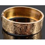 A wide Continental gold hinged bangle