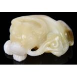 A contemporary Chinese jade carving of a recumbent buffalo