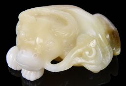 A contemporary Chinese jade carving of a recumbent buffalo