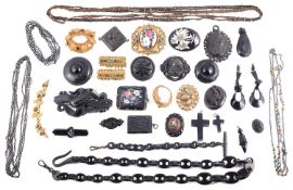A collection of Victorian carved Whitby jet and other mourning jewellery