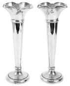 A pair of George V silver spill vases