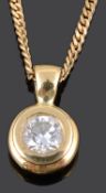 A contemporary single stone diamond set pendant on chain