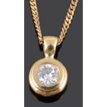 A contemporary single stone diamond set pendant on chain