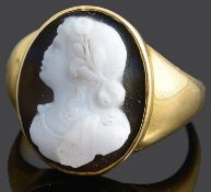 A 19th Century carved hard stone cameo set ring