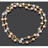 A contemporary Italian Chiampesan 9ct tricolour gold beaded necklace