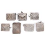 Six Edwardian silver stamp envelopes