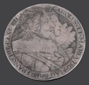 An engraved silver counter King Charles I and Henrietta Maria