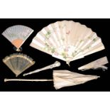 19th century horn brise fan, four other Continental and Oriental fans and an ivory and silk parasol