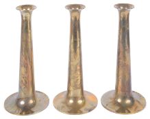 A set of three Danish Torben Oskov & Co brass candlesticks designed by Max Bruel