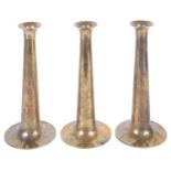 A set of three Danish Torben Oskov & Co brass candlesticks designed by Max Bruel