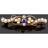 A Victorian sapphire diamond pearl scroll brooch