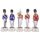 Five German porcelain figures of soldiers