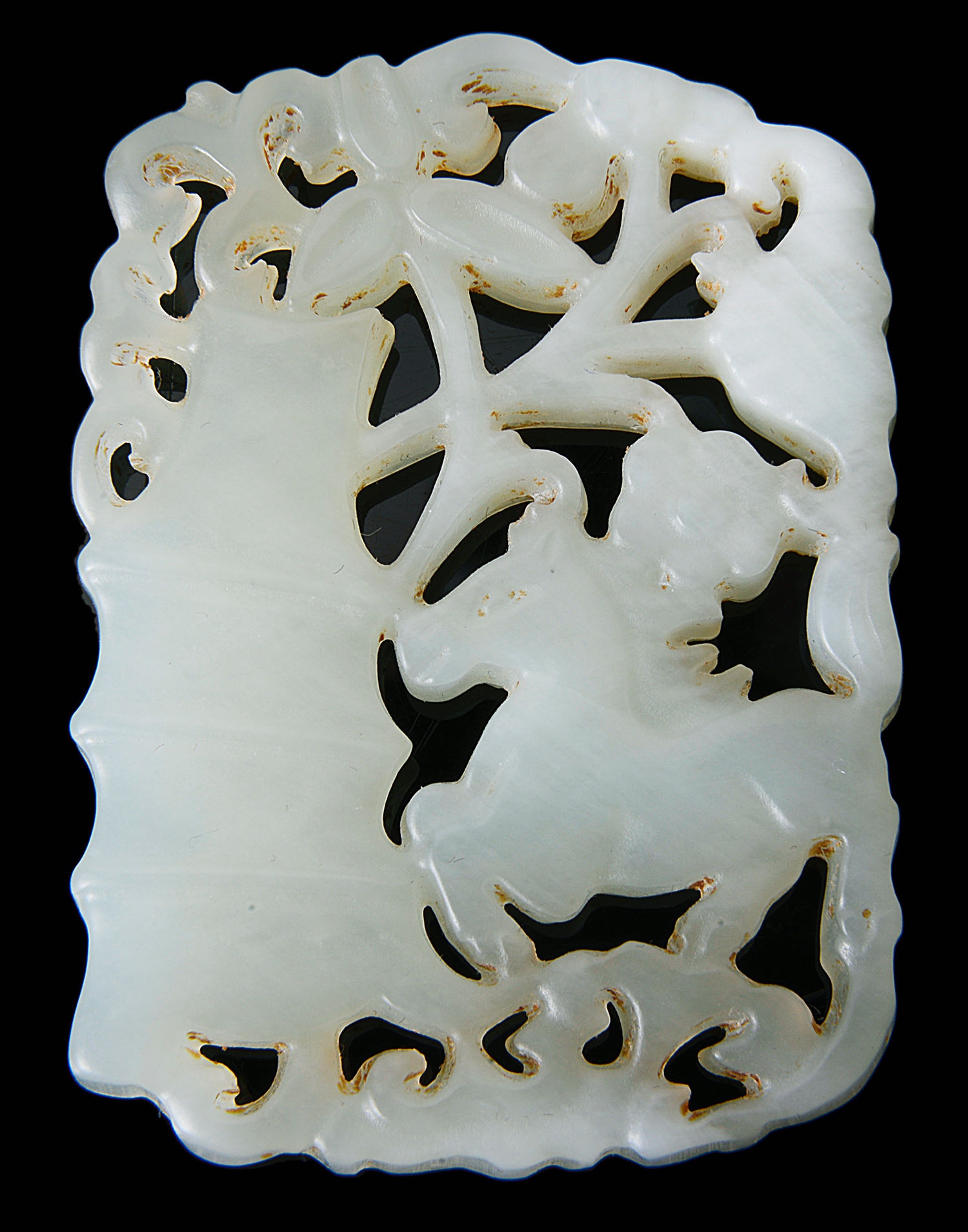 A contemporary Chinese pale celadon jade pendant