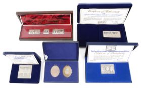 A collection of cased limited edition silver ingots relating to the Silver Jubilee