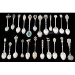 A comprehensive collection of mostly silver souvenir teaspoons